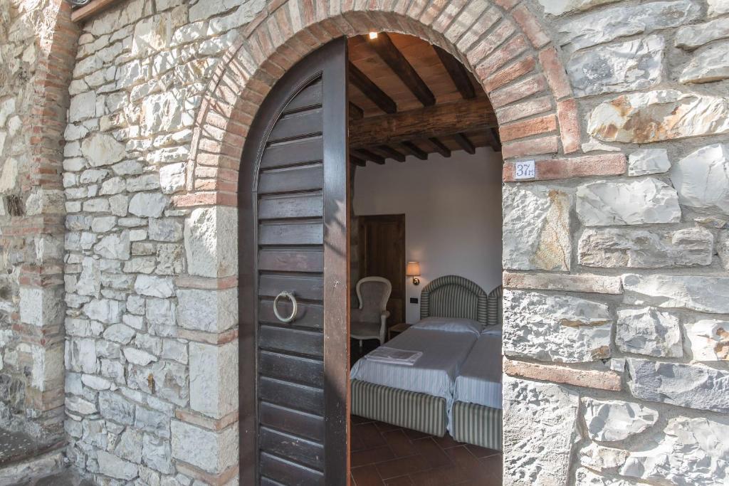 Relais Santa Cristina Guest House Рада ин Кианти Стая снимка